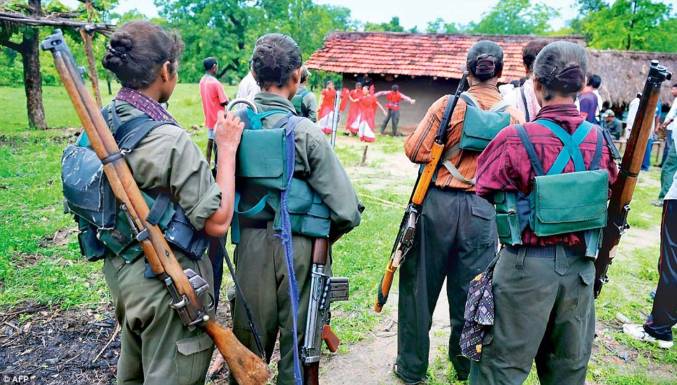 Naxals, or Naxalites are a communist guerilla group based in the west of India. The Photo shows Naxal Women.